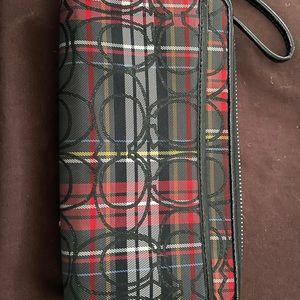 Used Coach Poppy multicolor graffiti wristlet wallet limited edition.